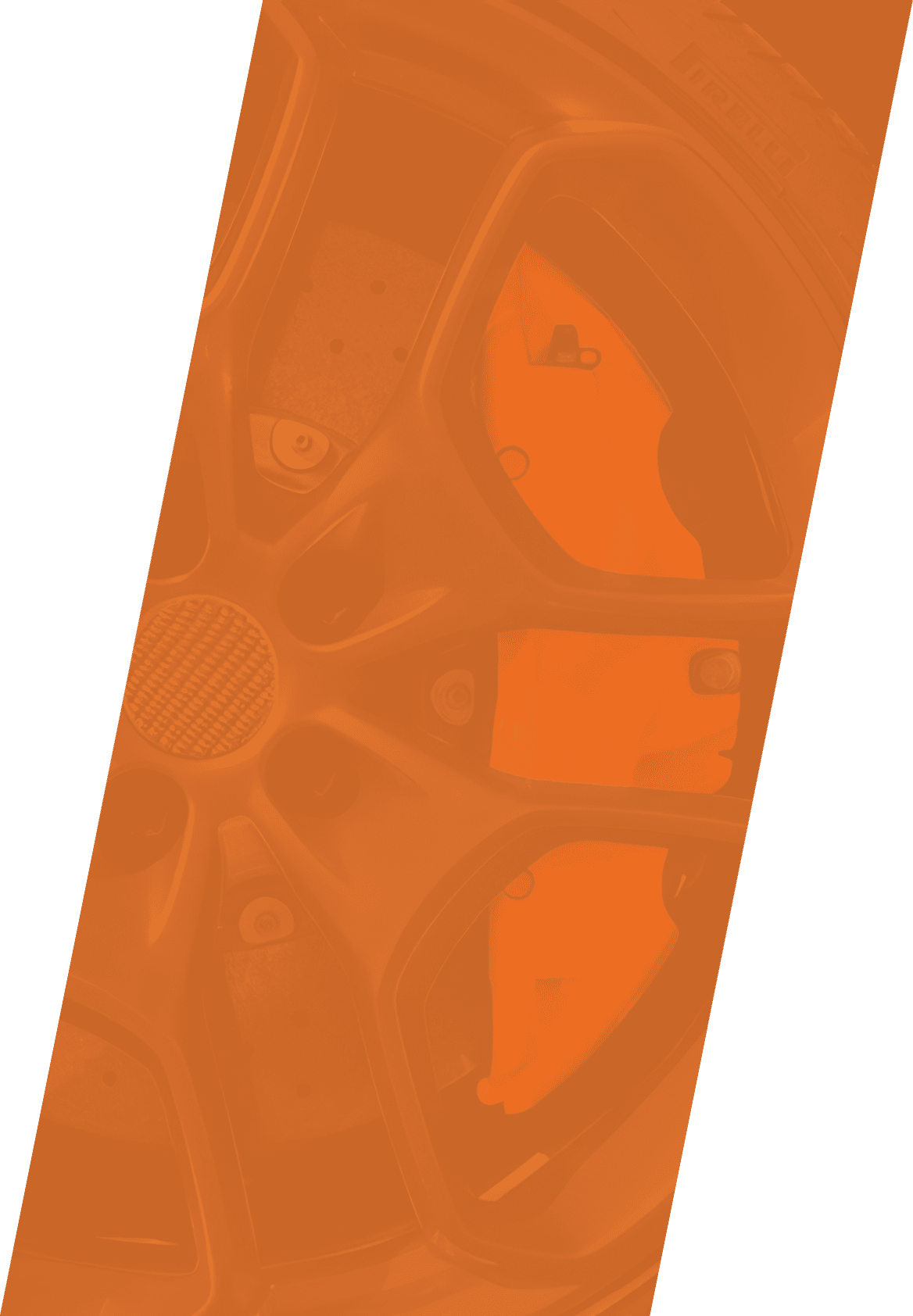 A black wheel with orange trim and a silver center. AI generated content